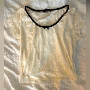 Cream and black trim, lace top, fitted, medium, semi-cropped, new